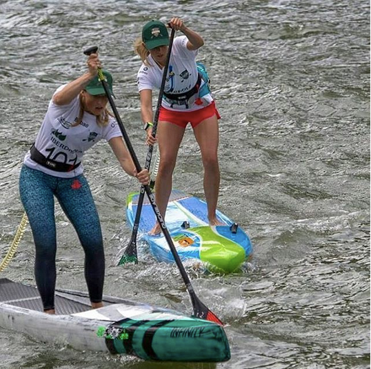 Verity Thomas & Robin Allix racing in the @bilbaoworldsupchallenge using Lunasurf SUP quick release waist belts with 10ft coiled Luna leash.